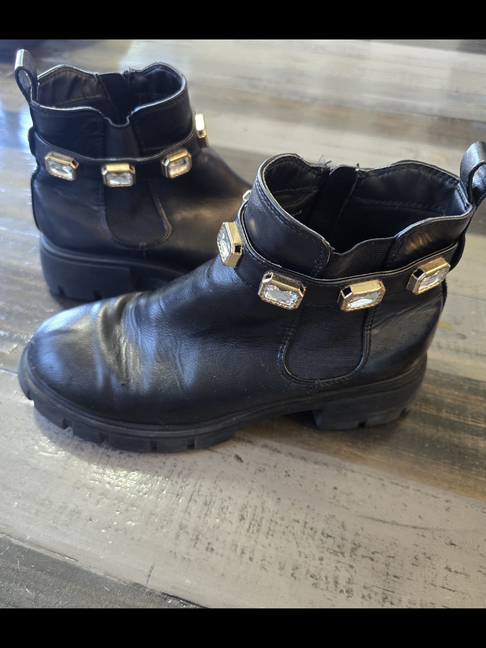 Coach Black Leather Ankle Boots with Gold Gem Accents